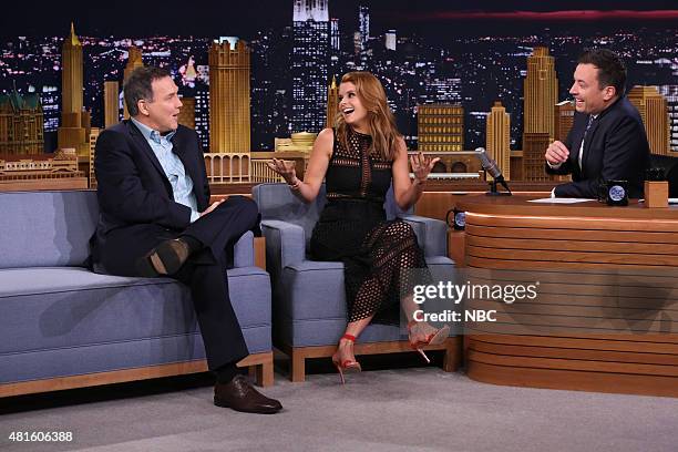 Episode 0296 -- Pictured: Comedian Norm Macdonald and actress Joanna Garcia Swisher during an interview with host Jimmy Fallon on July 22, 2015 --