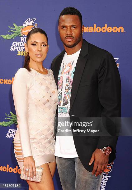 Player James Anderson and model Carissa Rosario arrive at the Nickelodeon Kids' Choice Sports Awards 2015 at UCLA's Pauley Pavilion on July 16, 2015...