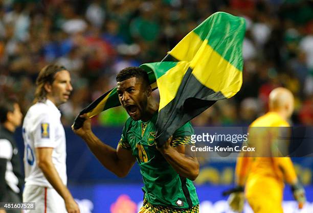 Adrian Mariappa of Jamaica celebrates their 2-1 win over the United States of America during the 2015 CONCACAF Golf Cup Semifinal match between...