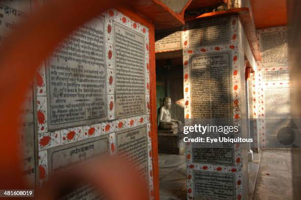 India, Uttar Pradesh, Varanasi, Hindu verse cover floor, walls and ceiling of a Hindu saints shrine near Tulsi Das Ghat