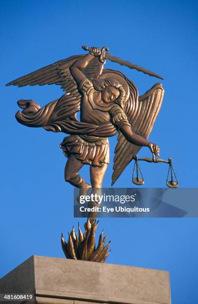 Egypt, Nile Valley, Aswan, Coptic Cathedral. Statue of the Archangel Michael holding sword and scales.