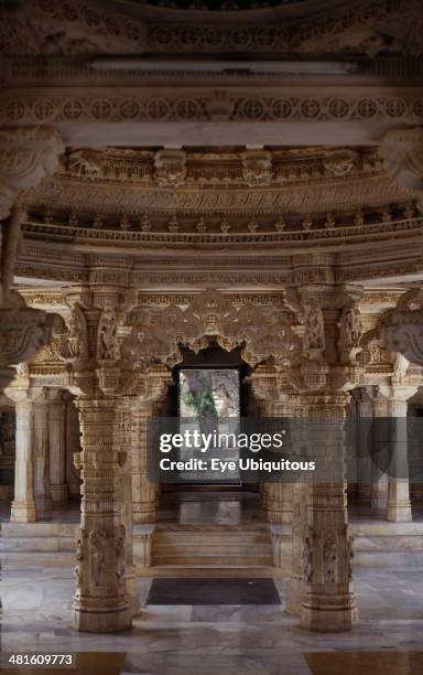 India, Rajasthan, Mount Abu, Dilwara Temple complex dating from 11th-13th century A.D. Detail of intricately carved white marble ceiling and...