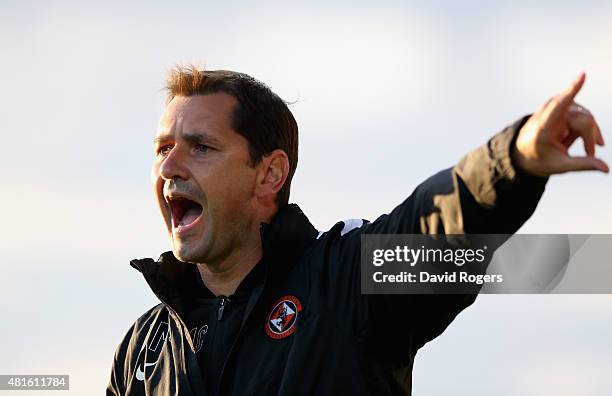 Jackie McNamara, the Dundee United manager shouts instructions during the pre season friendly match between Queens Park Rangers and Dundee United at...