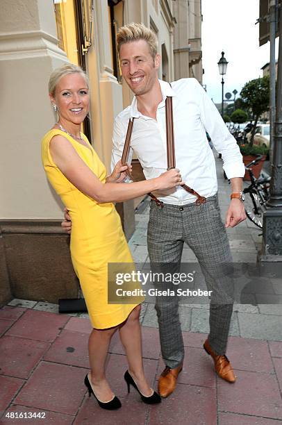 Maxi Arland and his wife Andrea Arland during the Eclat Dore summer party at Hotel Vier Jahreszeiten on July 22, 2015 in Munich, Germany.