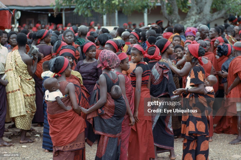 Group of women carrying babies on their backs at Ashanti funeral