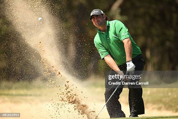 Steven Bowditch plays his shot on the 6th during the Final Round of the Valero Texas Open at TPC San Antonio AT&T Oaks Course on March 30, 2014 in...