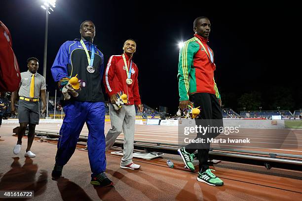 Toronto, On- JULY 22, 2015 Ramon Gittens won silver, Canada's Andre De Grasse gold and Antoine Adams SKN won bronze at the 2015 Pan Am men's 100m...