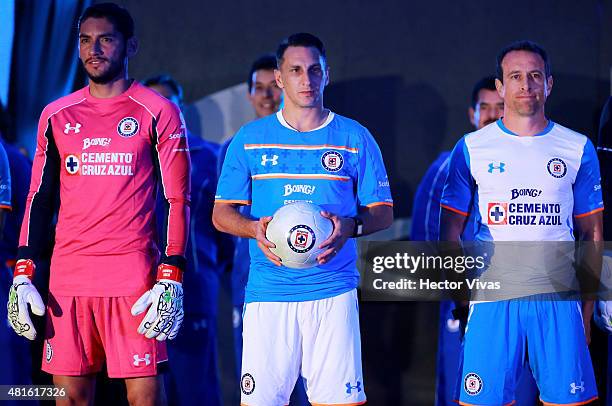 Jesus Corona, Christian Gimenez and Gerardo Torrado of Cruz Azul pose for pictures during the presentation of the new kit at Club Deportivo La Noria...