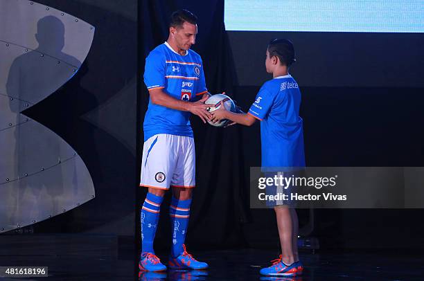 Christian Gimenez of Cruz Azul receives a ball during the presentation of the new kit at Club Deportivo La Noria on July 22, 2015 in Mexico City,...