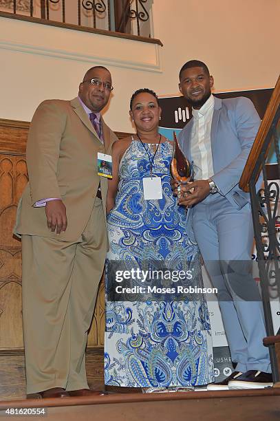 Neal Taylor, Tasha Taylor and recording artist Usher Raymond attend Ushers New Look United to Ignite Awards Exclusive VIP Reception on July 22, 2015...
