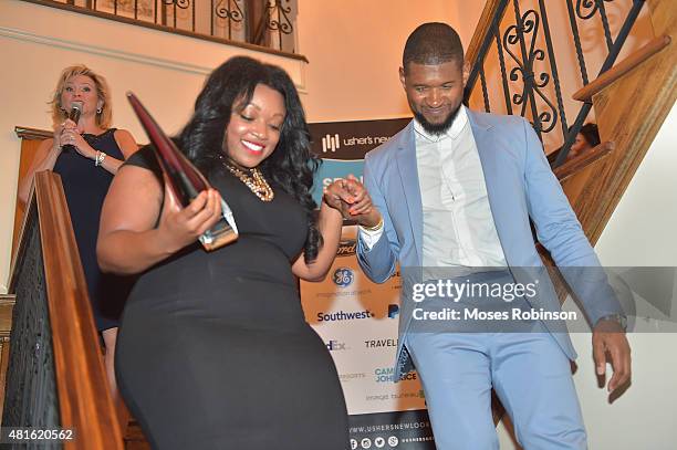 Quinnie Jenkins and recording artirts Usher Raymond attend Ushers New Look United to Ignite Awards Exclusive VIP Reception on July 22, 2015 in...