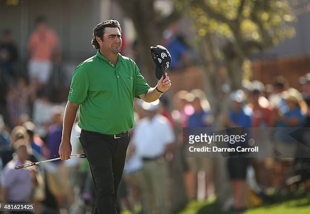 Steven Bowditch tips his hat to the crowd after putting and winning during the Final Round of the Valero Texas Open at TPC San Antonio AT&T Oaks...
