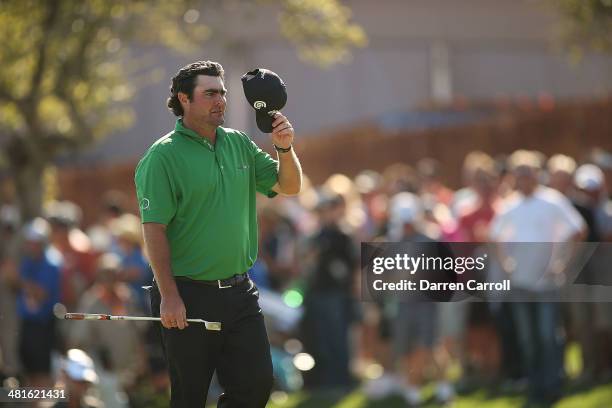 Steven Bowditch tips his hat to the crowd after putting and winning during the Final Round of the Valero Texas Open at TPC San Antonio AT&T Oaks...