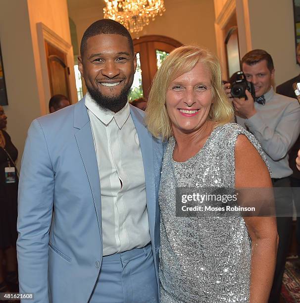 Recording Artist Usher Raymond and Sue Hrib attend Ushers New Look United to Ignite Awards Exclusive VIP Reception on July 22, 2015 in Atlanta,...