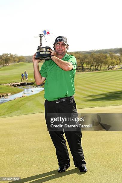 Champion Steven Bowditch with the trophy during the Final Round of the Valero Texas Open at TPC San Antonio AT&T Oaks Course on March 30, 2014 in San...