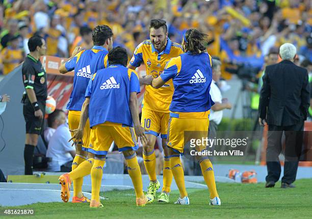 Andre Gignac of Tigres celebrates with teammates after scoring the opening goal during a semifinal second leg match between Tigres UANL and...