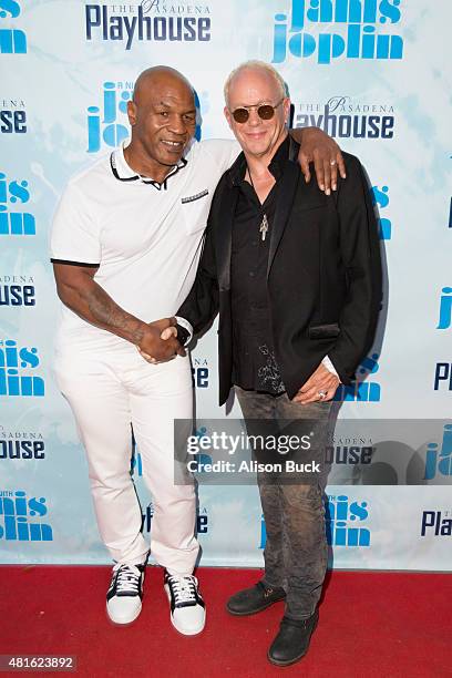 Mike Tyson and Randy Johnson attend "A Night With Janis Joplin" Los Angeles Opening Night Performance at Pasadena Playhouse on July 22, 2015 in...