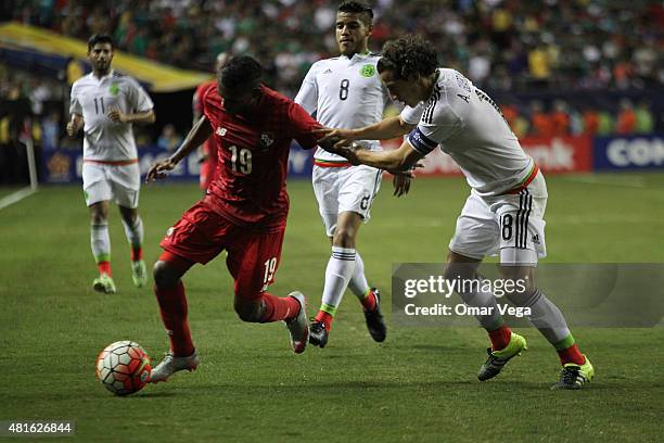 Andres Guardado of Mexico fights for the ball with Erick Davis of Panama during a semi final match between Mexico and Panama as part of Gold Cup 2015...