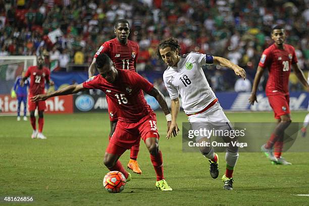 Andres Guardado of Mexico fights for the ball with Erick Davis of Panama during a semi final match between Mexico and Panama as part of Gold Cup 2015...