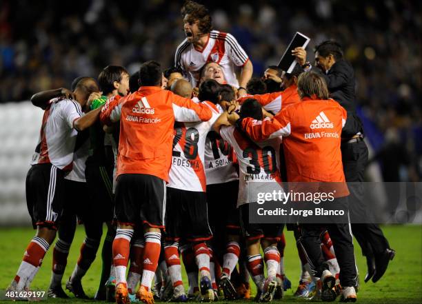 Players of River Plate celebrates after win a match between Boca Juniors and River Plate as part of 10th round of Torneo Final 2014 at Alberto J....