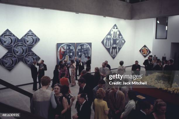 Robert Indiana art exhibition opening at the Museum of Modern Art, New York City, 1968.