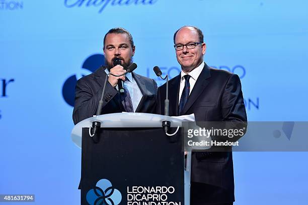 Leonardo DiCaprio and Prince Albert II of Monaco speak on stage during Dinner and Auction during The Leonardo DiCaprio Foundation 2nd Annual...