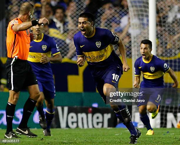 Juan Roman Riquelme, of Boca Juniors, celebrates after scoring during a match between Boca Juniors and River Plate as part of 10th round of Torneo...