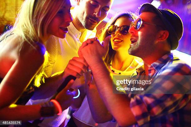 group of people on a karaoke contest. - choir stage stock pictures, royalty-free photos & images