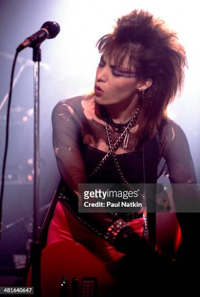 Musician Joan Jett performs onstage at the Thirsty Whale bar during filming of the movie 'Light of Day' , Chicago, Illinois, April 7, 1986.
