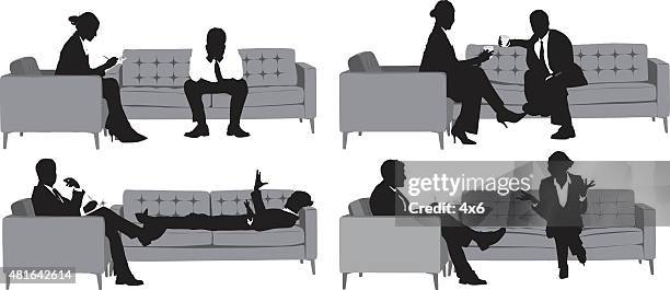 business people sitting on sofa - couple having coffee stock illustrations