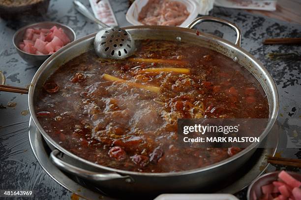 China-food-culture-lifestyle,FEATURE by Carol Huang This photo taken on February 22, 2014 shows hot pot food at a hot pot museum and factory in...