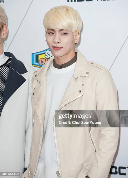 SHINee pose for photographs during the MBC Music 'Show Champion' 100th anniversary event at Bitmaru on March 19, 2014 in Goyang, South Korea.