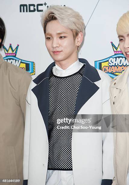 SHINee pose for photographs during the MBC Music 'Show Champion' 100th anniversary event at Bitmaru on March 19, 2014 in Goyang, South Korea.