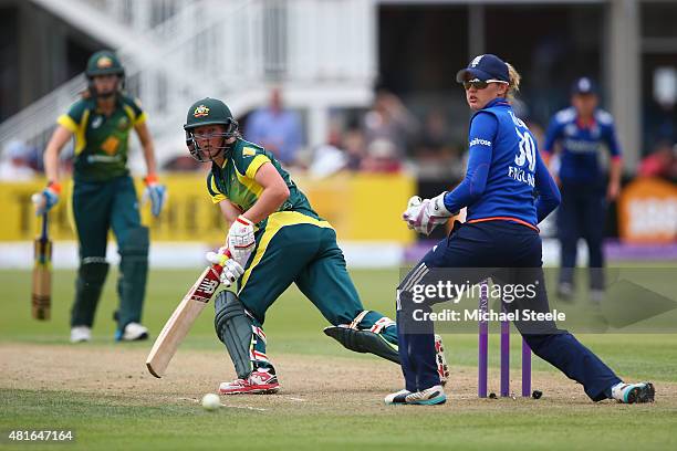 Meg Lanning of Australia sweeps to fine leg off the bowling of Heather Knight as wicketkeeper Sarah Taylor looks on during the 2nd Royal London ODI...