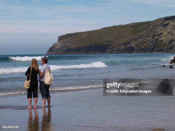 Middle aged couple at the beach, Trebarwith Strand, Cornwall, UK.