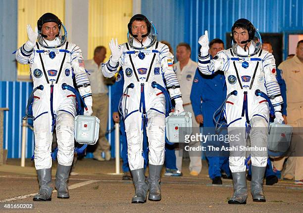 Expedition 44 Flight Engineer Kimiya Yui of the Japan Aerospace Exploration Agency , Flight Engineer Kjell Lindgren of NASA and Soyuz Commander Oleg...