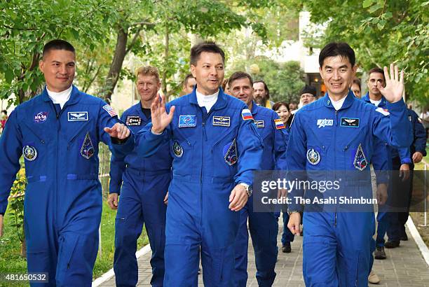 Expedition 44 Flight Engineer Kimiya Yui of the Japan Aerospace Exploration Agency , Flight Engineer Kjell Lindgren of NASA and Soyuz Commander Oleg...