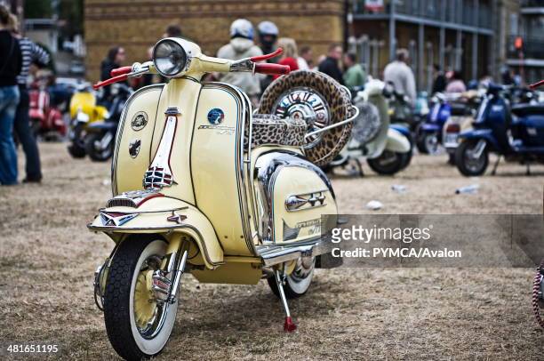 Yellow Lambretta TV175 is displayed on Ryde Common during the Isle Of Wight Rally 2009..