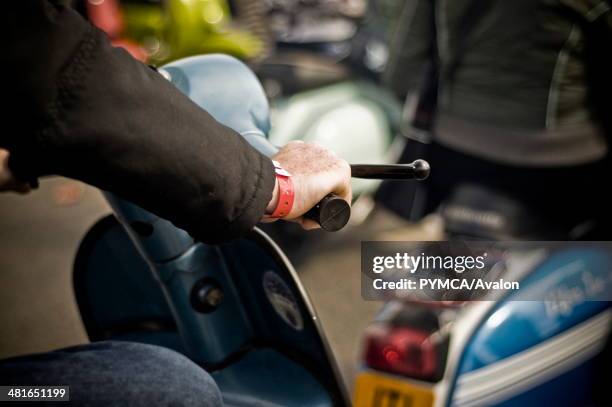 Scooterist opens up the throttle on his Vespa during the Rideout, Isle Of Wight Scooter Rally 2010..