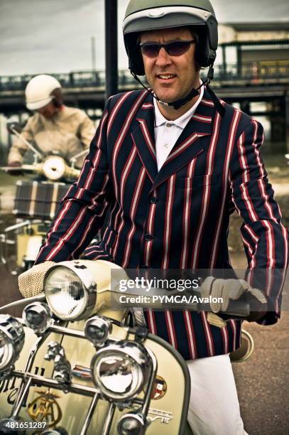 Mod in a Boating Jacket poses on his Lambretta. Ryde Seafront, Isle Of Wight Scooter Rally 2010. .