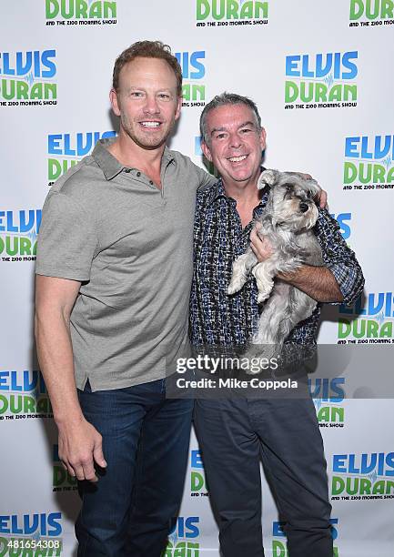 Actor Ian Ziering and Elvis Duran pose for a picture at "The Elvis Duran Z100 Morning Show"at Z100 Studio on July 23, 2015 in New York City.