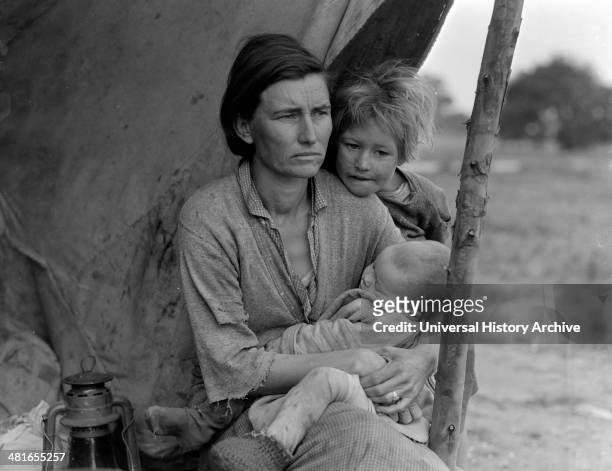 Migrant agricultural worker's family. Seven hungry children. Mother aged thirty-two. Father is native Californian. Nipomo, California by Dorothea...