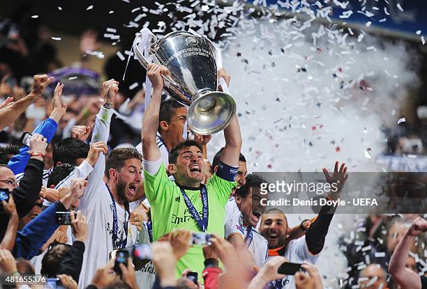 Captain Iker Casillas of Real Madrid lifts the trophy following his team's 4-1 victory during to the UEFA Champions League Final between Real Madrid...