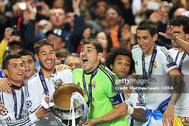 Captain Iker Casillas of Real Madrid lifts the trophy following his team's 4-1 victory during the UEFA Champions League Final between Real Madrid CF...