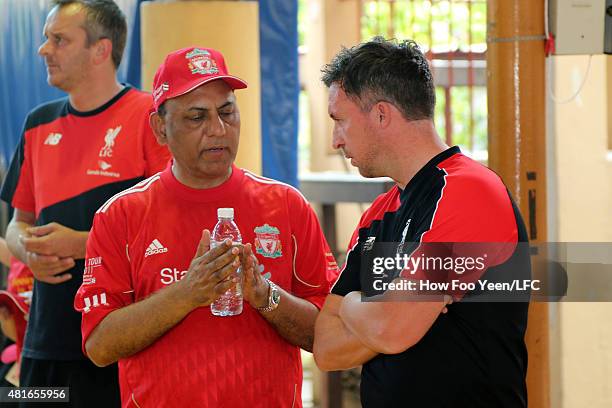 Dato' Arif Siddiqui and Robbie Fowler at the visually impaired school during a football clinic on July 23, 2015 in Kuala Lumpur, Malaysia.