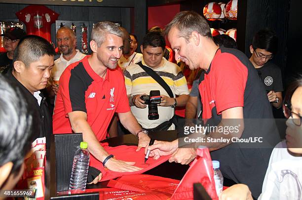 Former Liverpool Legend Dietmar Hamann signs autograph for a fan at the official Liverpool FC boutique in Lot 10 Mall on July 23, 2015 in Kuala...