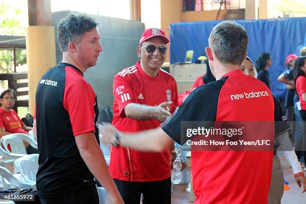 Robbie Fowler speaks to Dato' Arif Siddiqui of Stand Chart at the visually impaired school on July 23, 2015 in Kuala Lumpur, Malaysia.