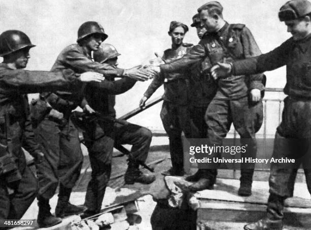 April 25 Soviet and American troops meet at the River Elbe, near Torgau in Germany, marking an important step toward the end of World War II in...