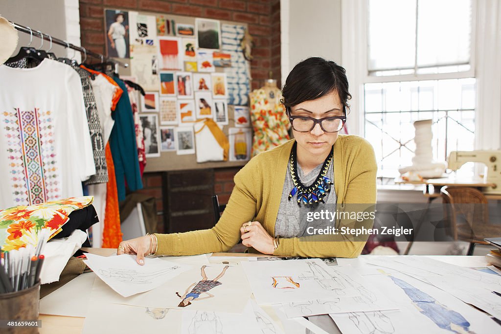 Fashion designer working in her studio