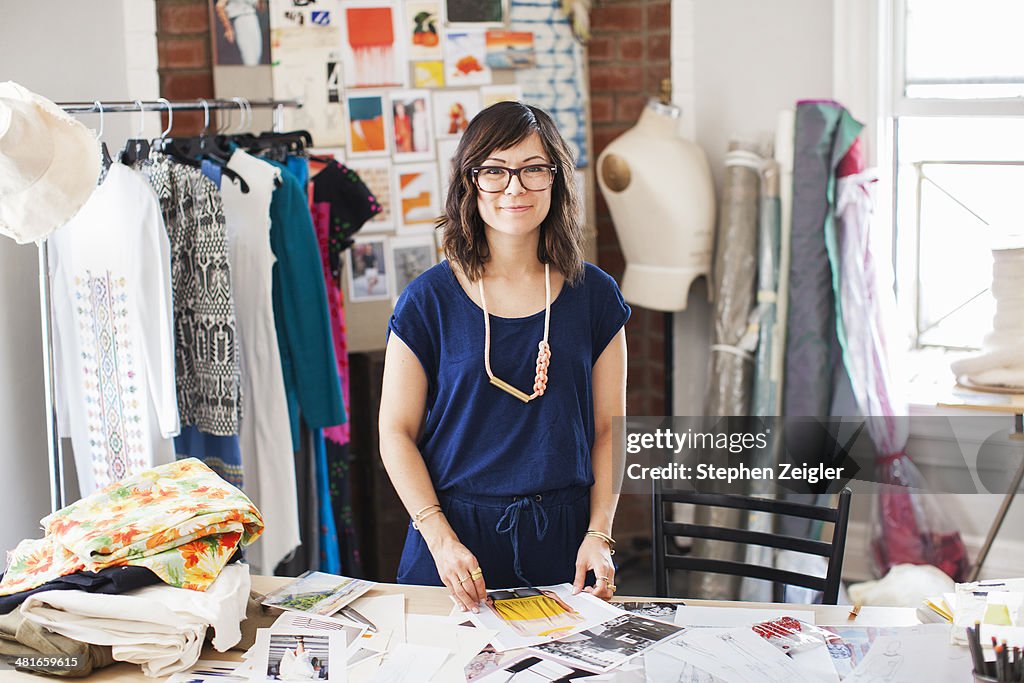 Fashion designer in her studio